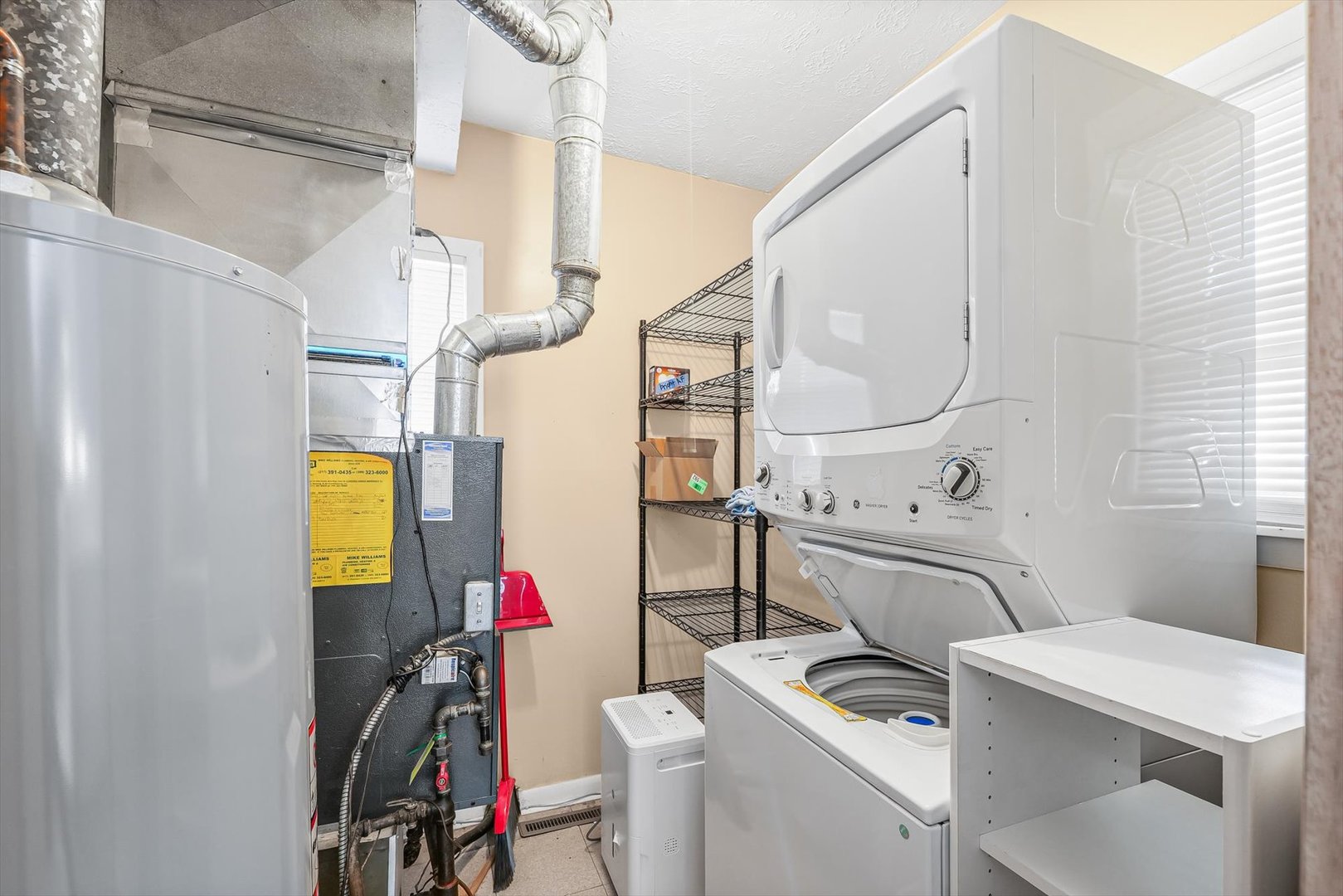 606 Cullom Street Normal, IL 61761 - Photo 21 of 27 a utility room with dryer and washer