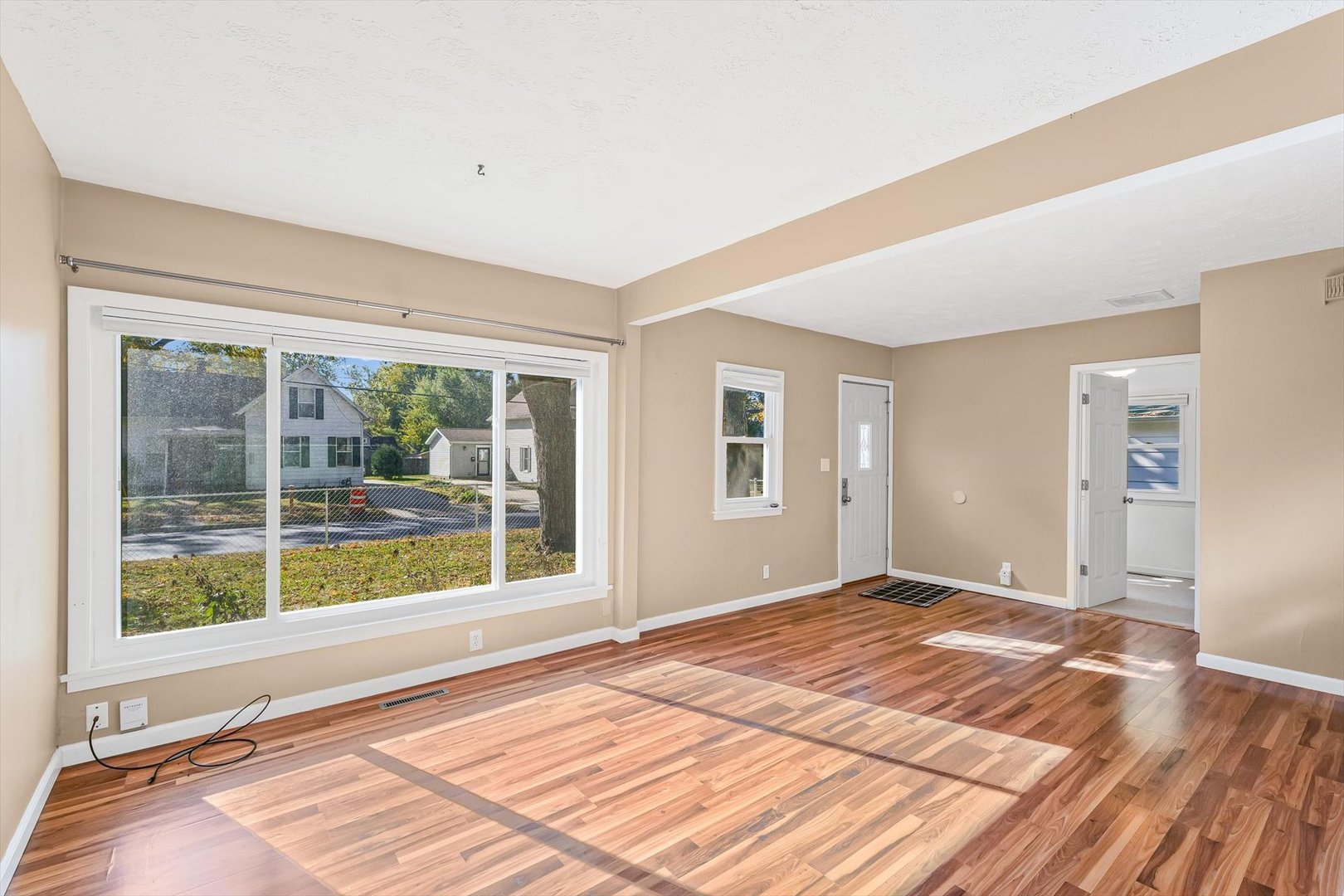606 Cullom Street Normal, IL 61761 - Photo 6 of 27 a bedroom with a bed and a large window