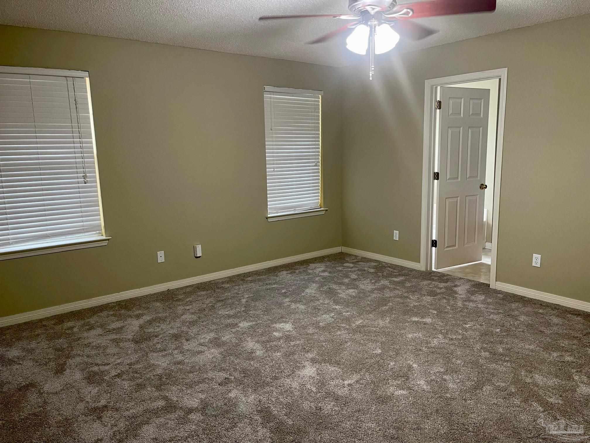 5162 Goshawk Drive Milton, FL 32570 - Photo 13 of 26 a view of an empty room with a window