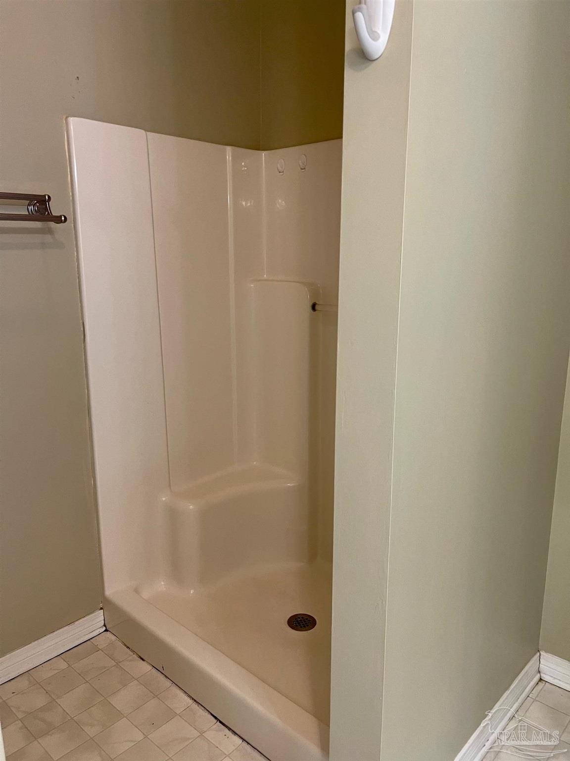 5162 Goshawk Drive Milton, FL 32570 - Photo 18 of 26 a bathroom with a shower