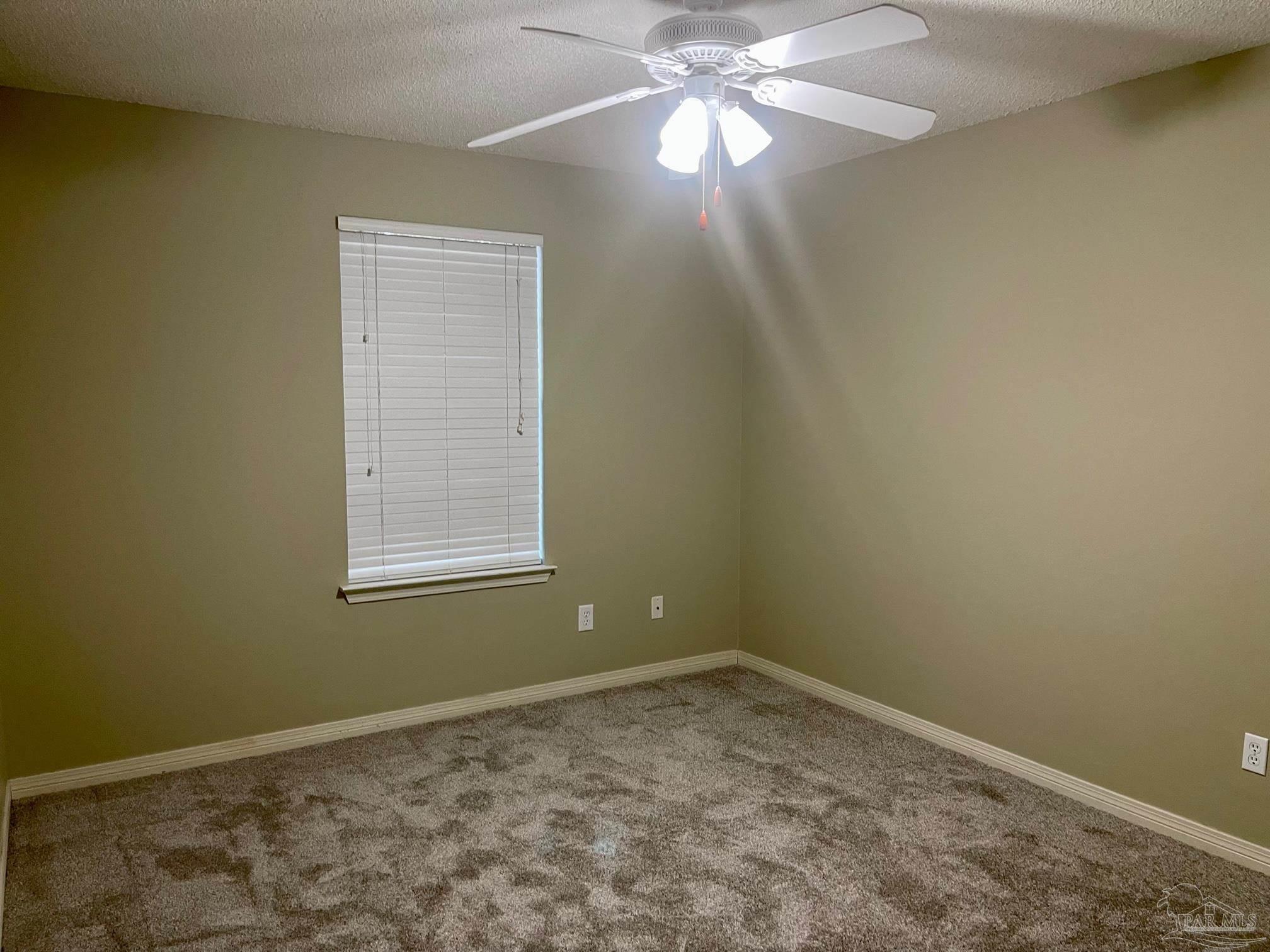 5162 Goshawk Drive Milton, FL 32570 - Photo 21 of 26 a view of an empty room with a window