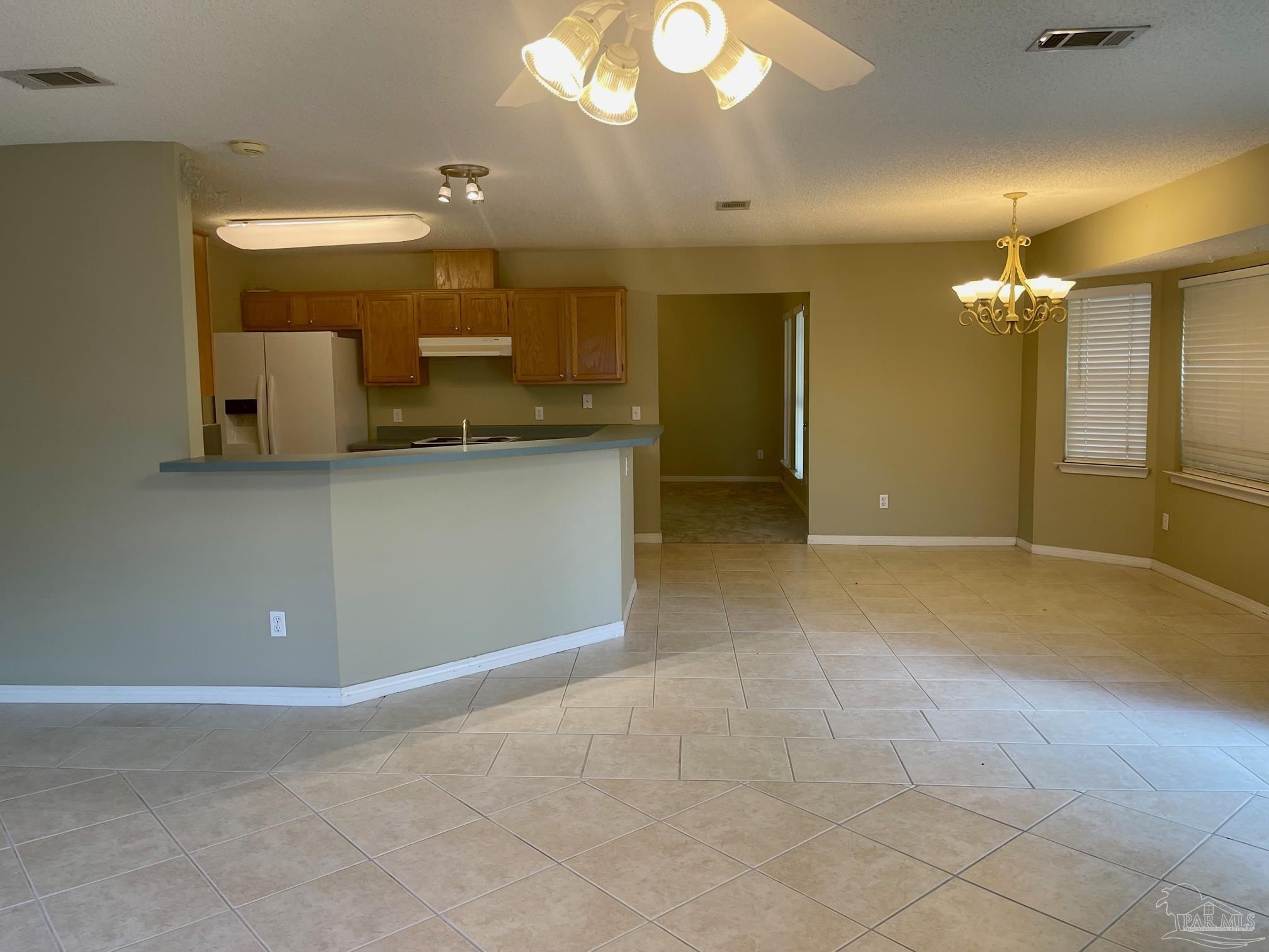 5162 Goshawk Drive Milton, FL 32570 - Photo 5 of 26 a view of a kitchen with a sink