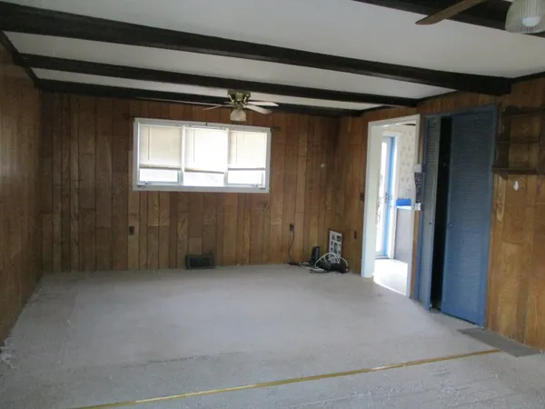 a view of an empty room and window