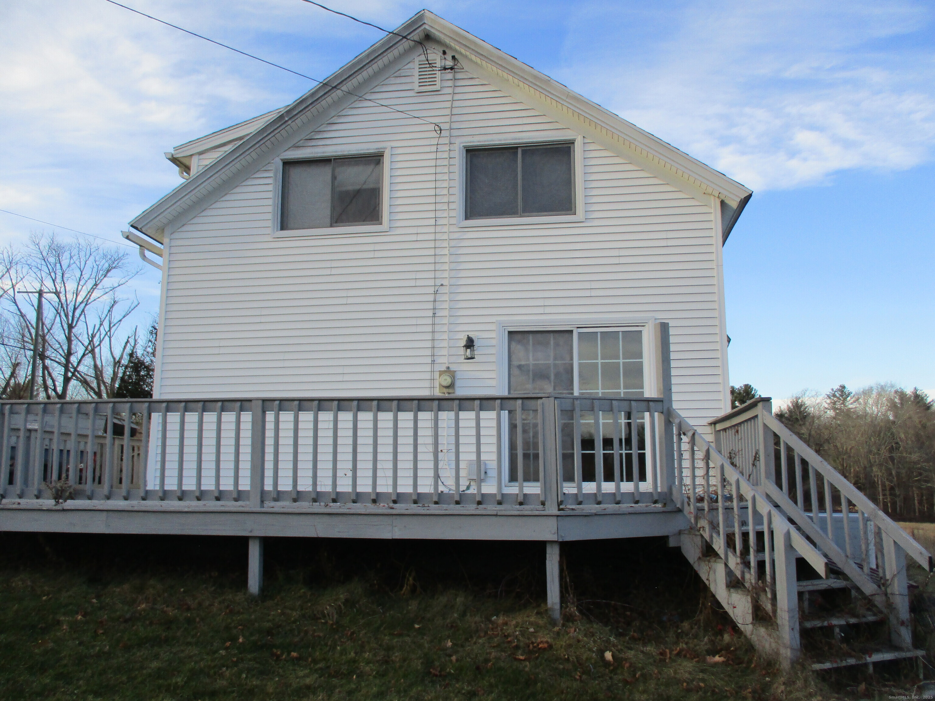 151 Brandy Hill Road Thompson, CT 06277 - Photo 24 of 36 a view of a house with backyard and deck