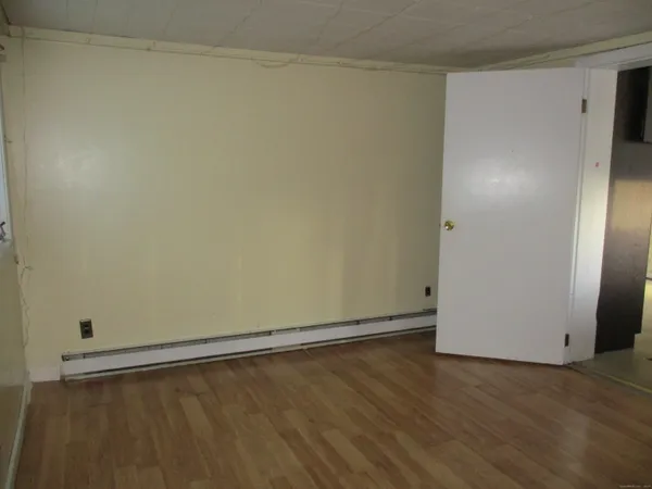 a kitchen with a sink and a refrigerator