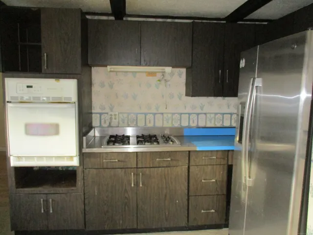 a view of an empty room with stairs