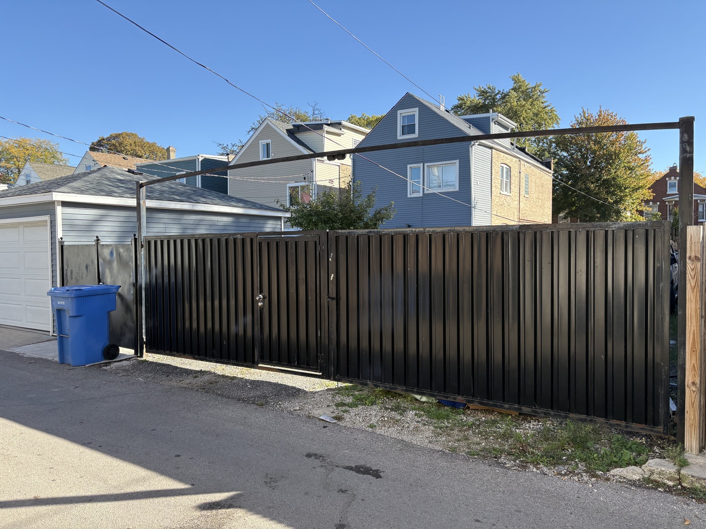 3158 South Harding Avenue Chicago, IL 60623 - Photo 7 of 9 a front view of a house with iron fence