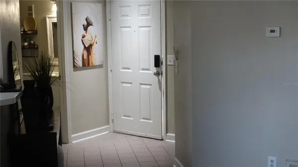 a white toilet sitting next to a bathroom sink and a shower