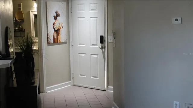 a white toilet sitting next to a bathroom sink and a shower