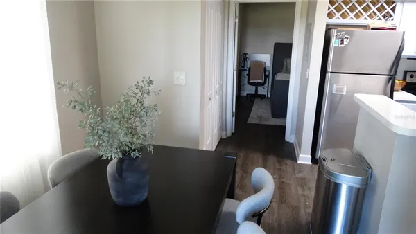 a bedroom with a bed and a television