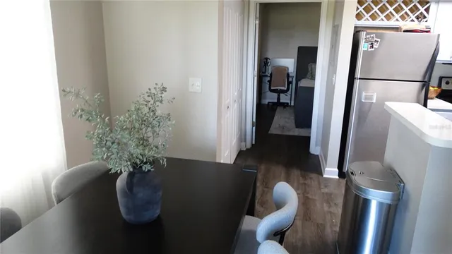 a bedroom with a bed and a television