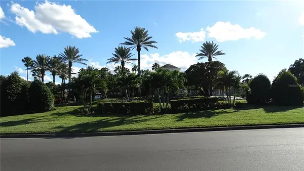a view of a golf course with a park