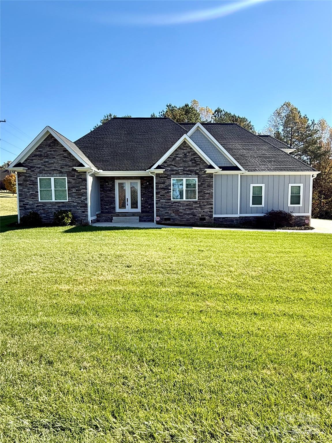 3508 Alfalfa Street Conover, NC 28613 - Photo 1 of 35 a view of a house with a big yard and large trees