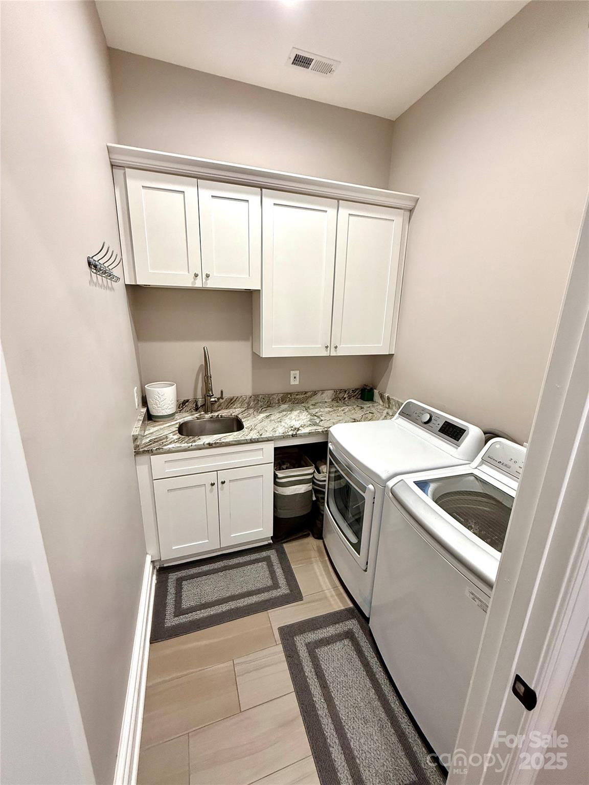3508 Alfalfa Street Conover, NC 28613 - Photo 21 of 35 a kitchen with a stove window and cabinets
