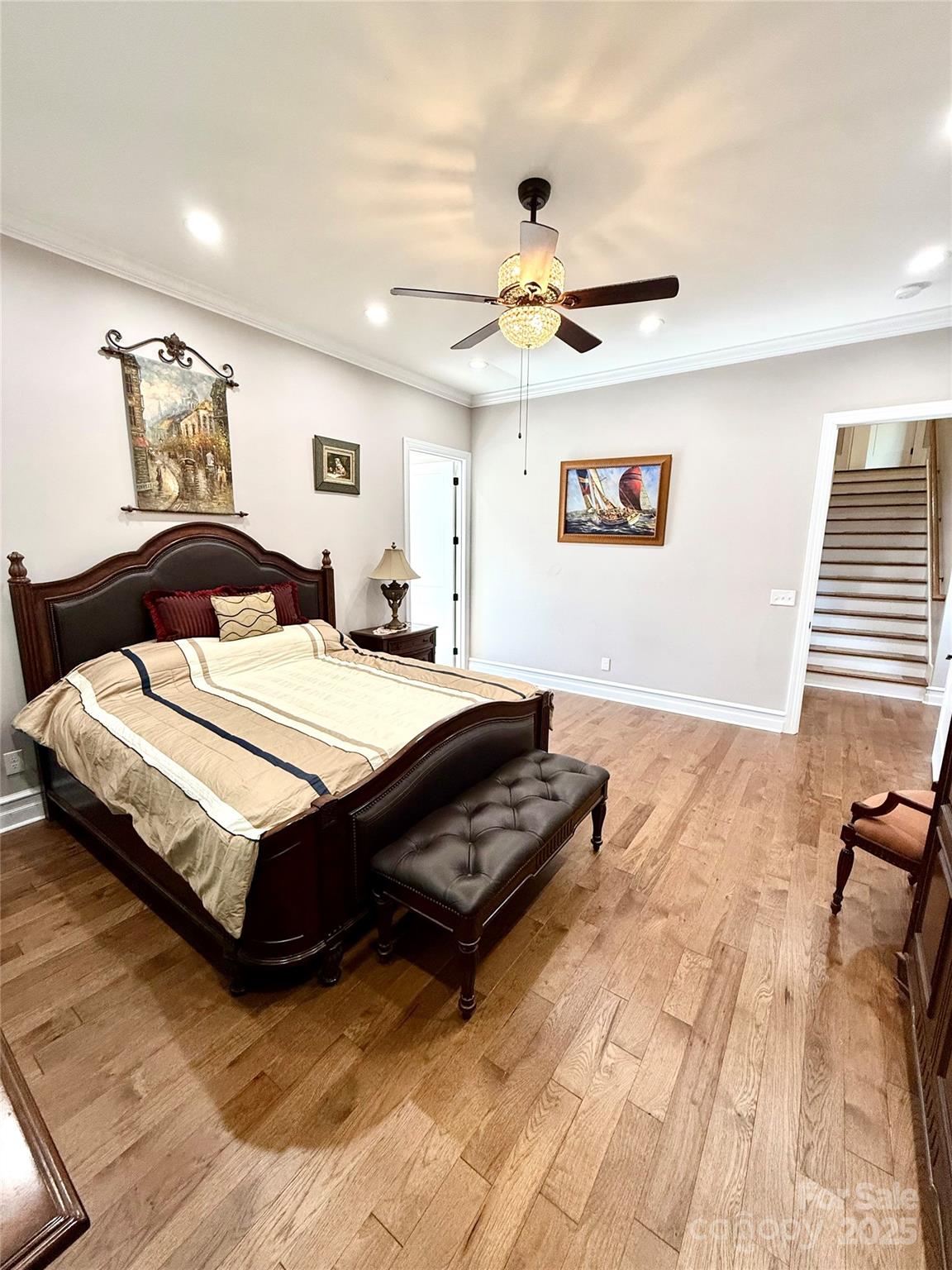 3508 Alfalfa Street Conover, NC 28613 - Photo 23 of 35 a bedroom with a bed and a chandelier