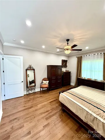 a room with furniture and a flat screen tv