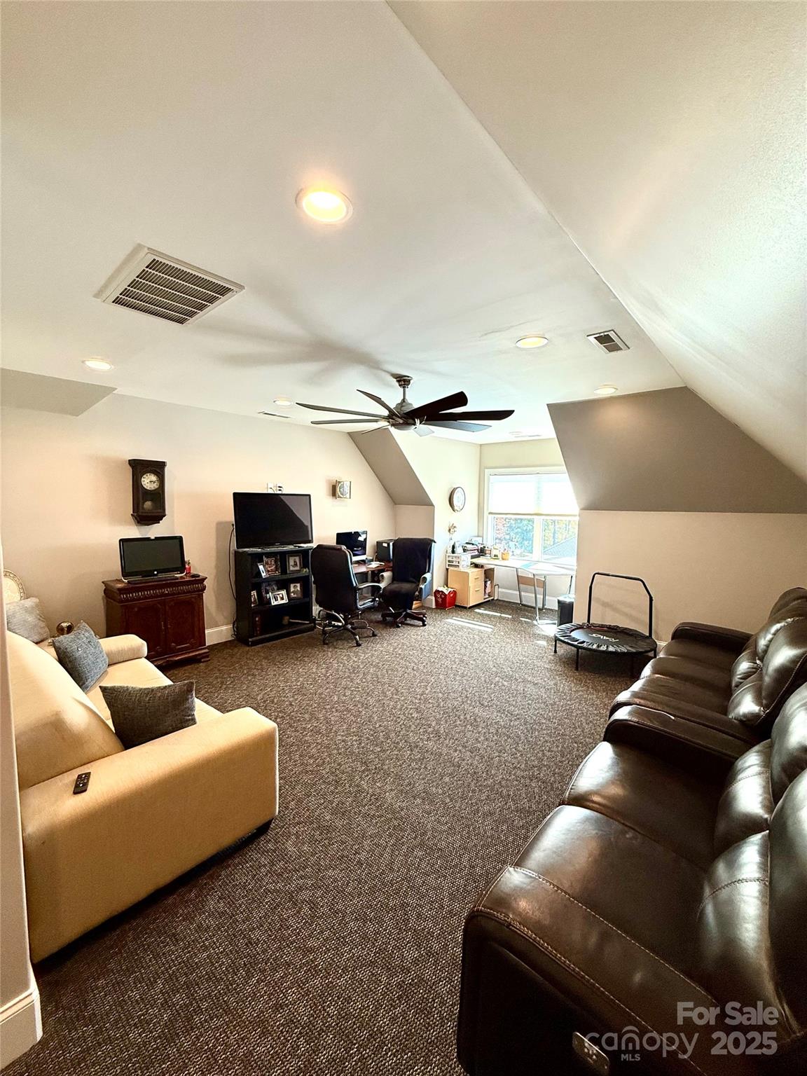 3508 Alfalfa Street Conover, NC 28613 - Photo 32 of 35 a living room with furniture and a chandelier
