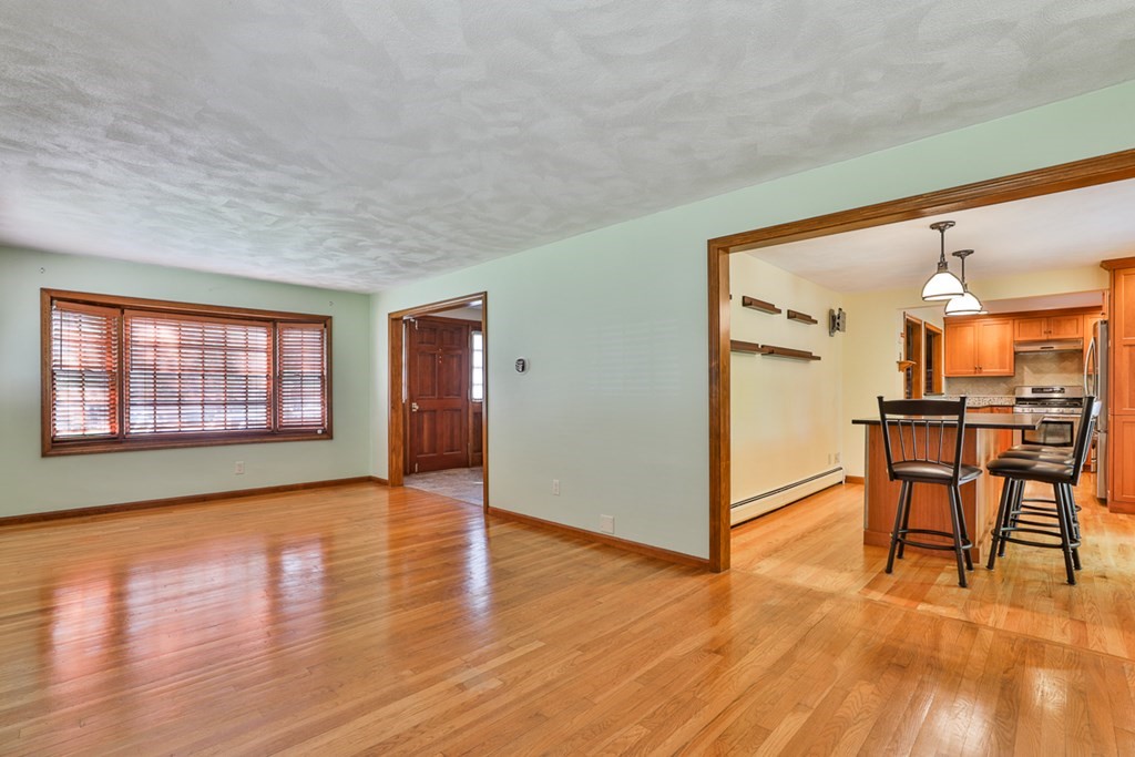 9 Handel Road Billerica, MA 01821 - Photo 11 of 40 a view of a room with furniture and wooden floor