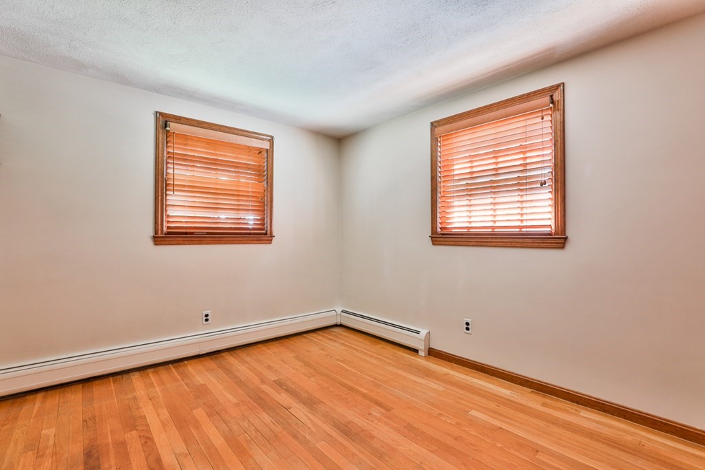 9 Handel Road Billerica, MA 01821 - Photo 35 of 40 an empty room with a window