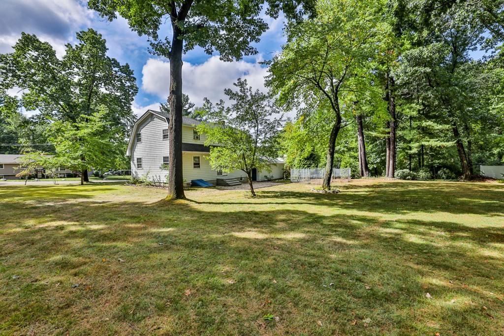 9 Handel Road Billerica, MA 01821 - Photo 5 of 40 a garden view with a fountain