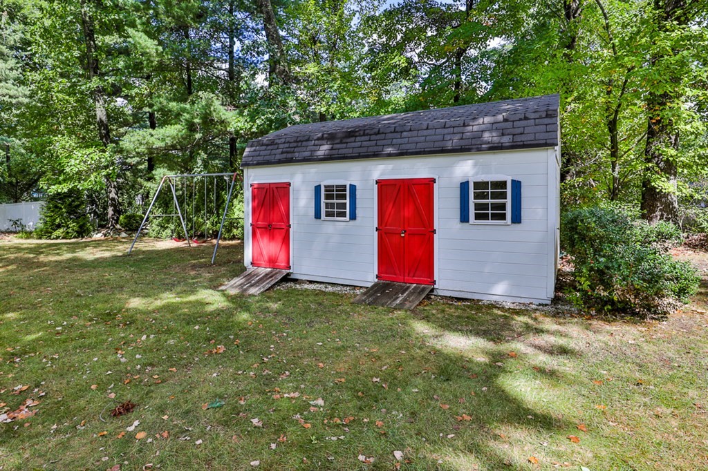 9 Handel Road Billerica, MA 01821 - Photo 6 of 40 a view of backyard of house with green space