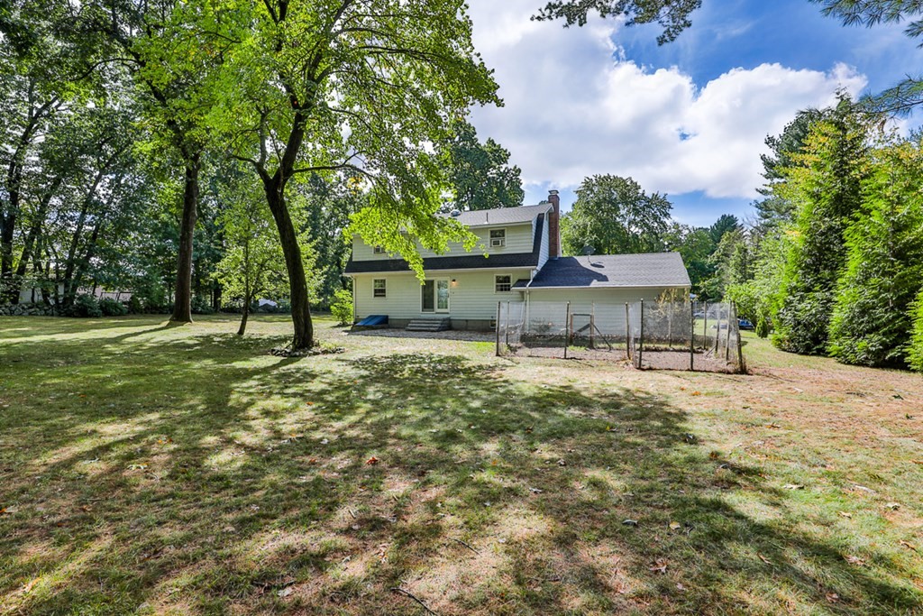 9 Handel Road Billerica, MA 01821 - Photo 7 of 40 a view of a house with a yard