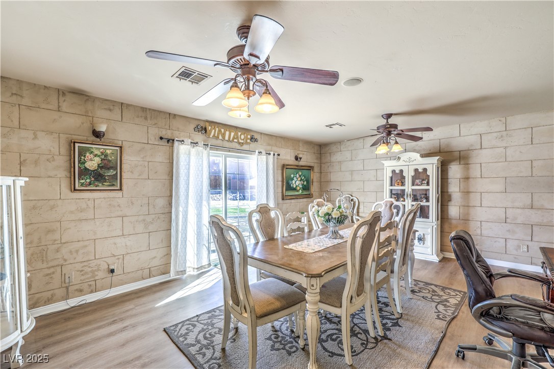 3192 North Taylor Street Logandale, NV 89021 - Photo 17 of 36 Dining space with light hardwood / wood-style floors and ceiling fan