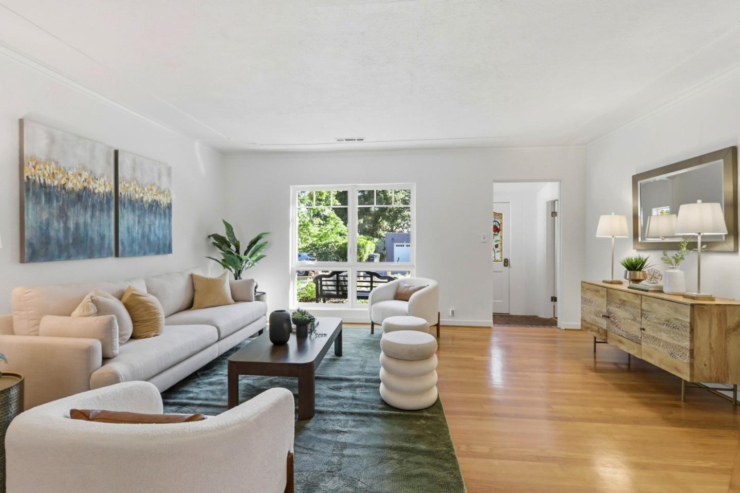 20360 Orchard Road Saratoga, CA 95070 - Photo 11 of 43 a living room with furniture and a large window