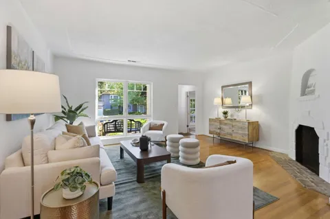 a kitchen with a sink cabinets and window