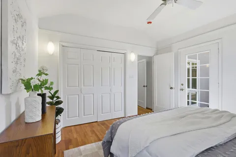 a view of a patio with a table and chairs