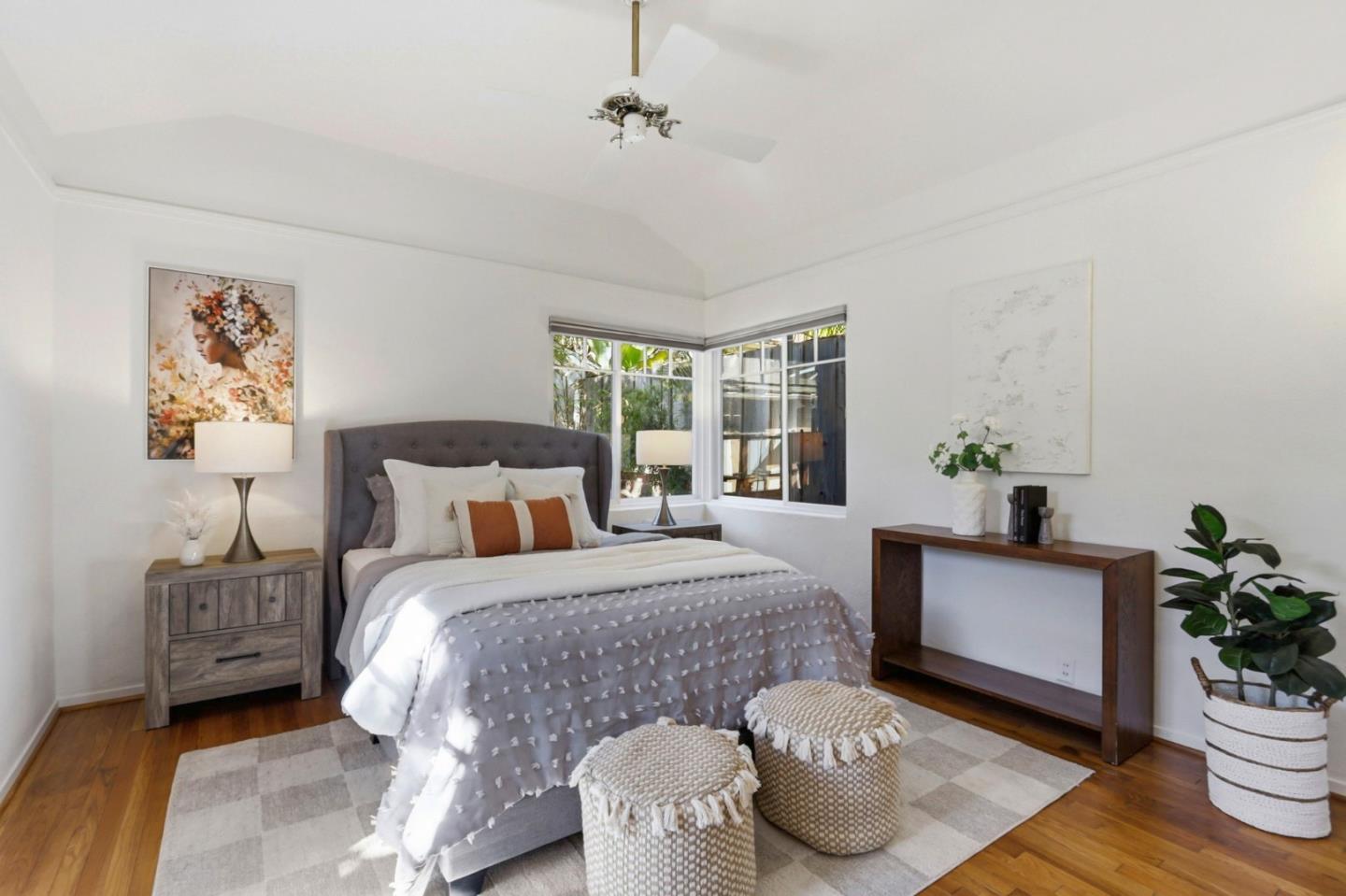 20360 Orchard Road Saratoga, CA 95070 - Photo 31 of 43 a bedroom with a bed and a potted plant