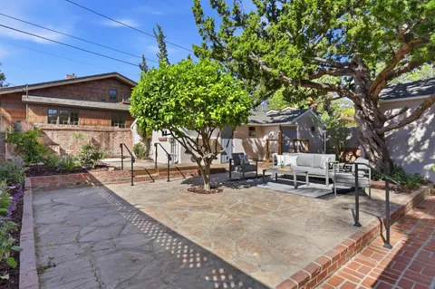 a view of a house with a patio