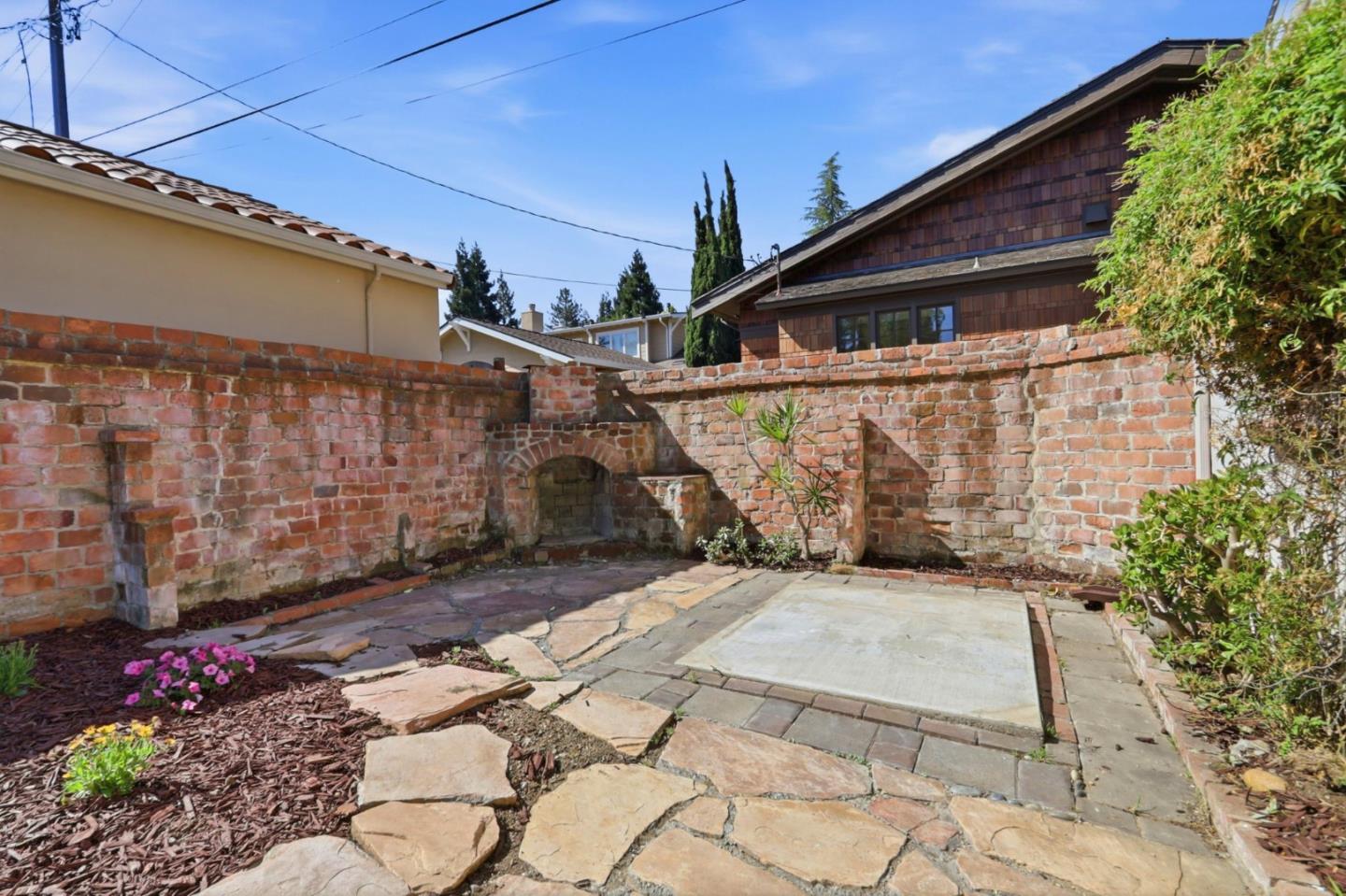 20360 Orchard Road Saratoga, CA 95070 - Photo 37 of 43 a view of a house with a patio