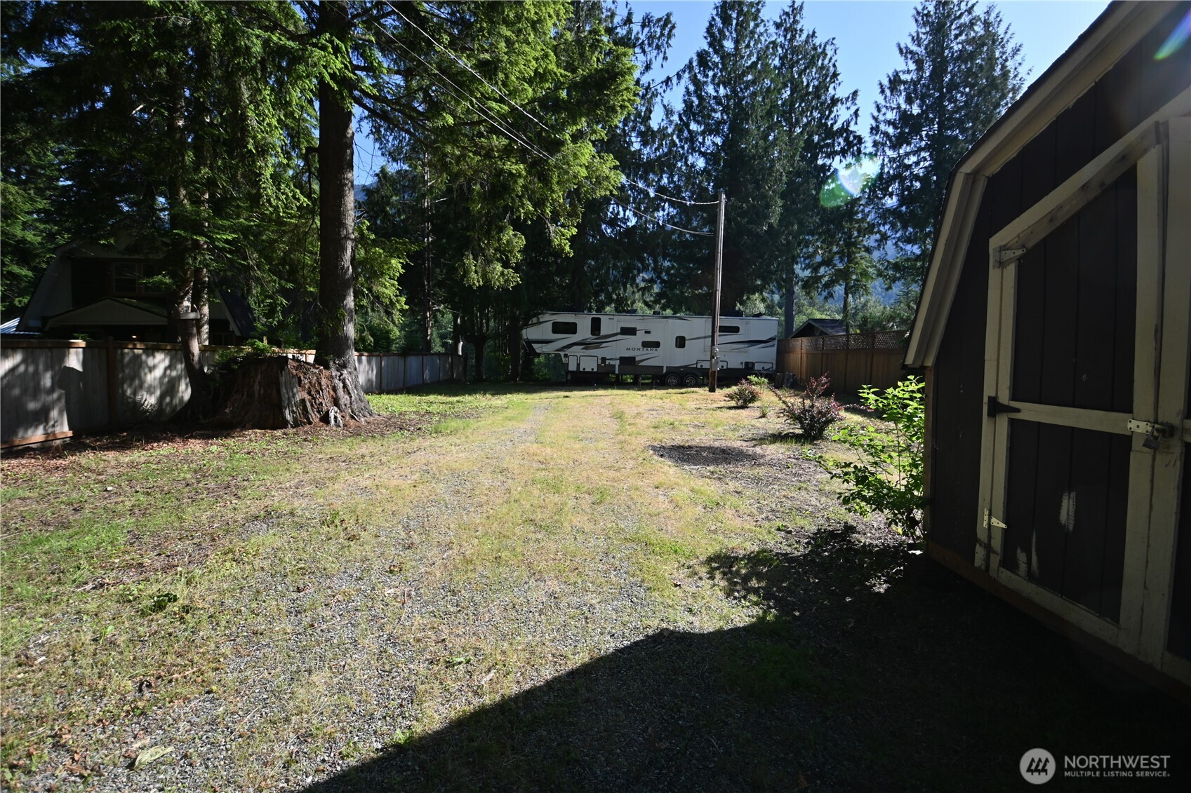 44725 Fir Road Gold Bar, WA 98251 - Photo 8 of 17 a backyard of a house with lots of green space