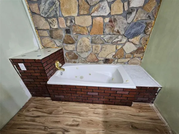 a bathroom with a bathtub