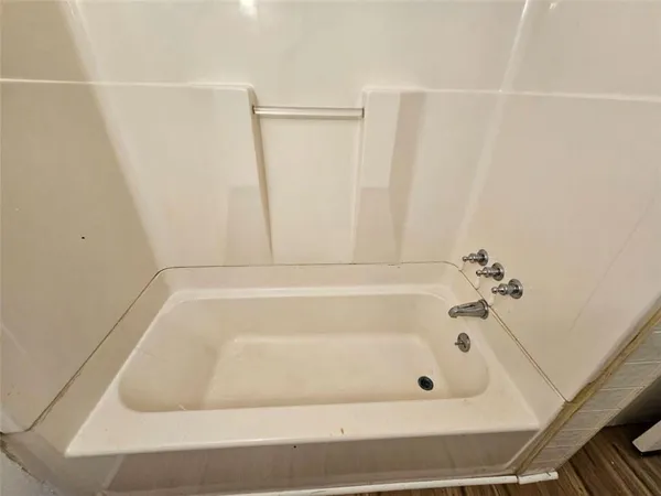 a view of a house with large trees