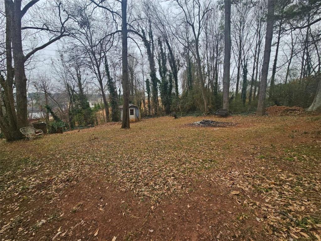 1252 Lawrenceville-Suwanee Road Lawrenceville, GA 30043 - Photo 21 of 64 a view of outdoor space with trees