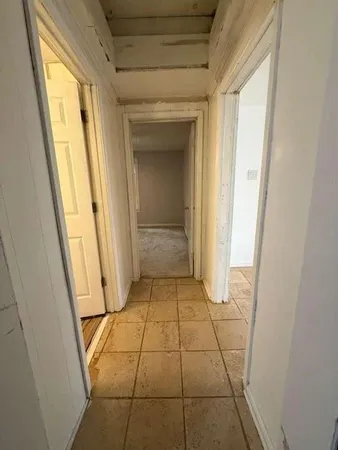 a view of empty yard with trees
