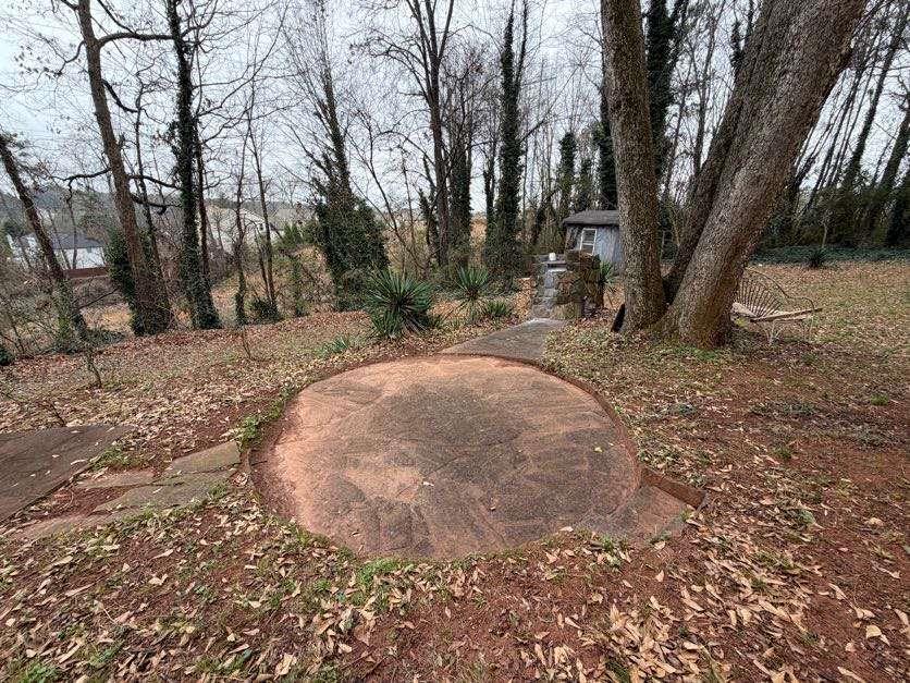 1252 Lawrenceville-Suwanee Road Lawrenceville, GA 30043 - Photo 59 of 64 a view of a backyard with large trees