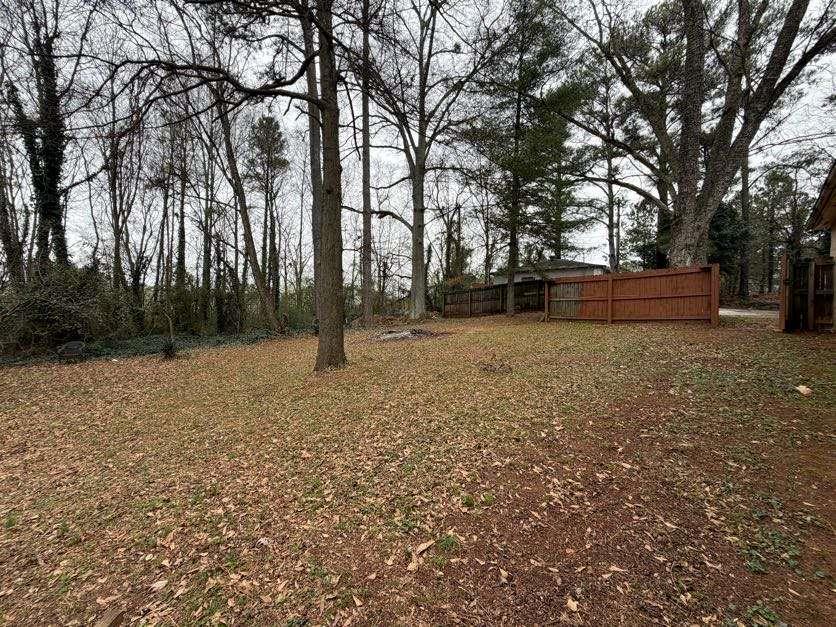 1252 Lawrenceville-Suwanee Road Lawrenceville, GA 30043 - Photo 61 of 64 a view of a yard with trees