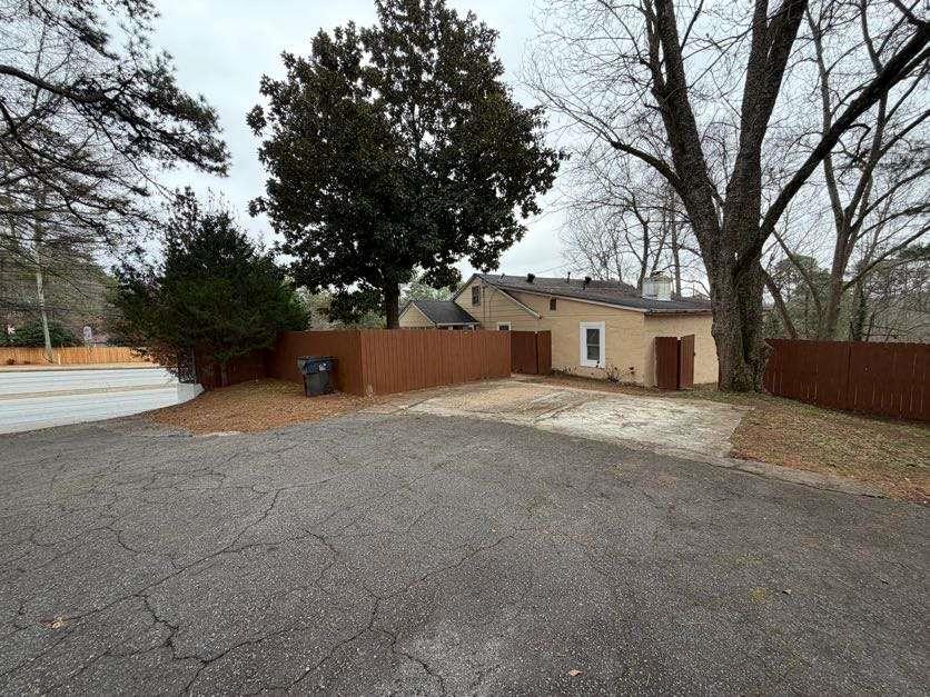 1252 Lawrenceville-Suwanee Road Lawrenceville, GA 30043 - Photo 64 of 64 a house view with a outdoor space