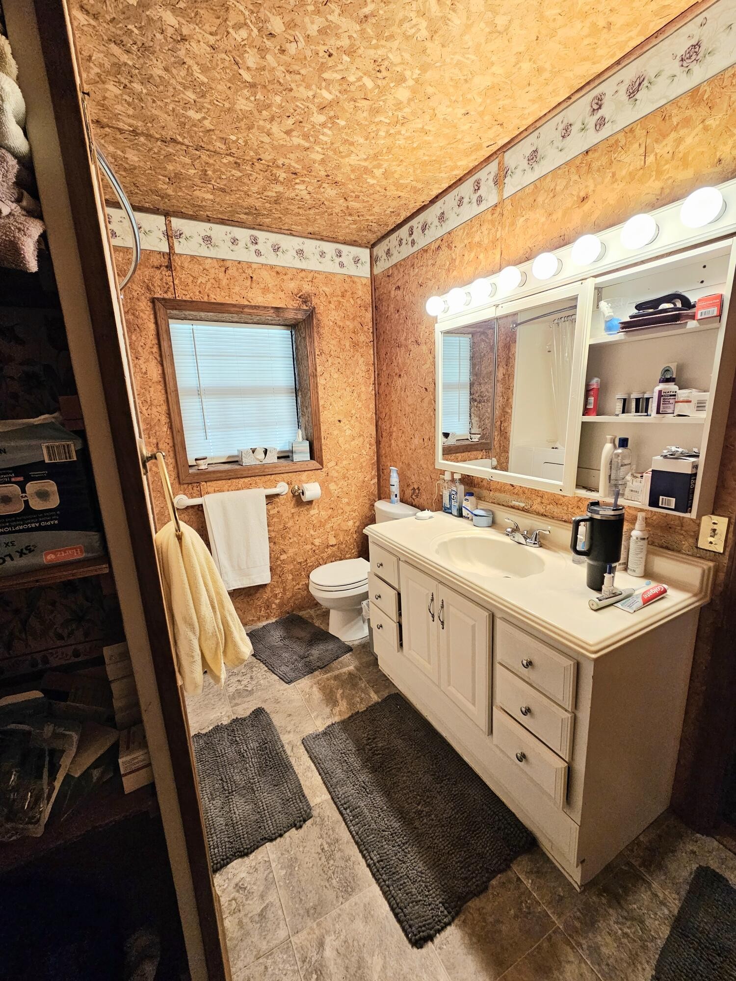 1262 Johnson Road Southeast Cleveland, TN 37323 - Photo 16 of 34 a bathroom with a double vanity sink and mirror