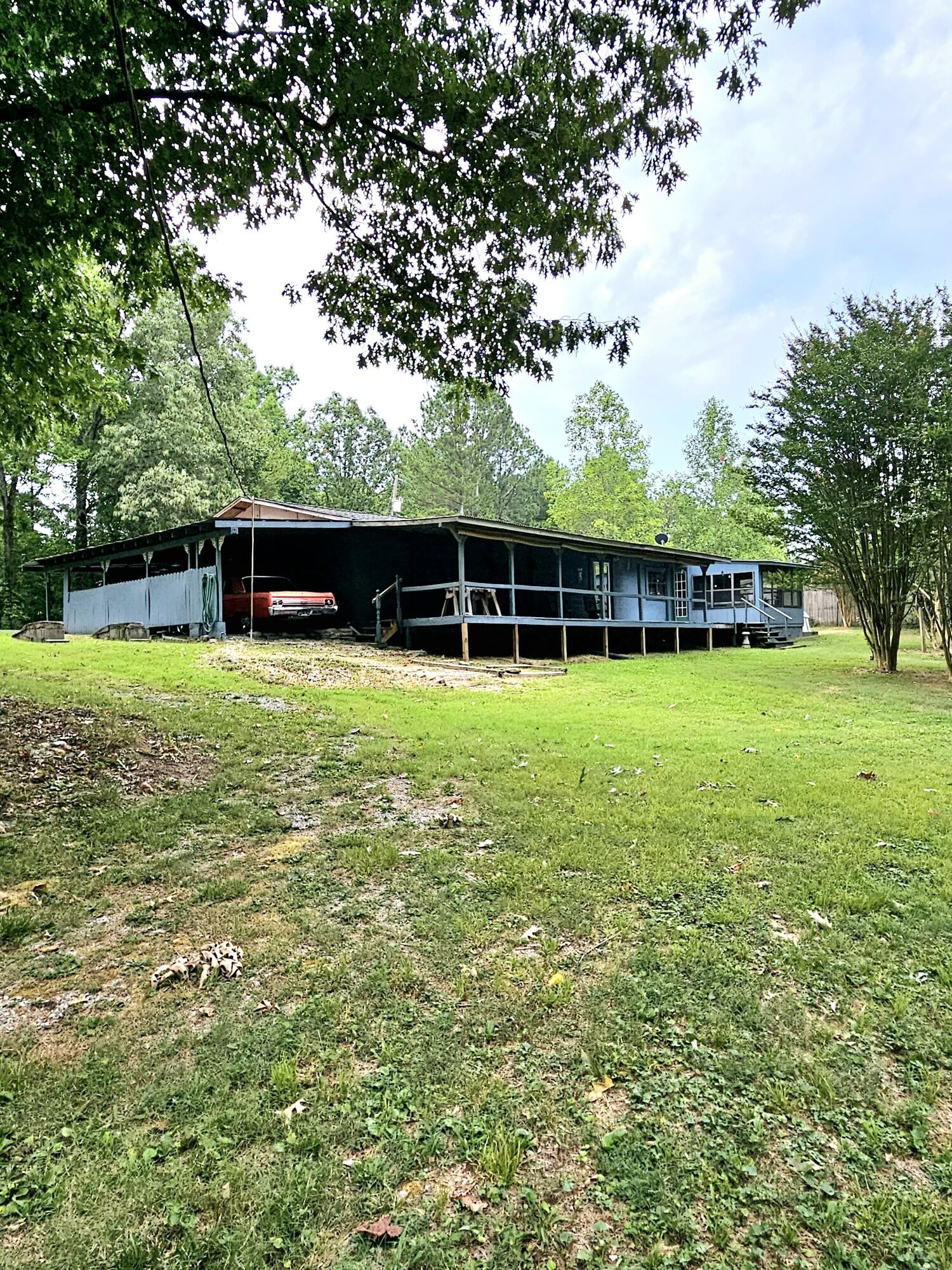 1262 Johnson Road Southeast Cleveland, TN 37323 - Photo 27 of 34 a view of a swimming pool with an outdoor space and seating area