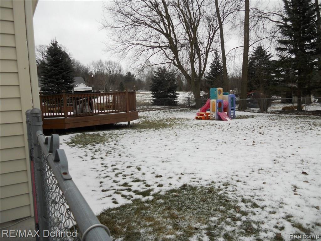 747 Cardinal Court Howell, MI 48843 - Photo 20 of 25 Large fenced yard with no close neighbors on the one side