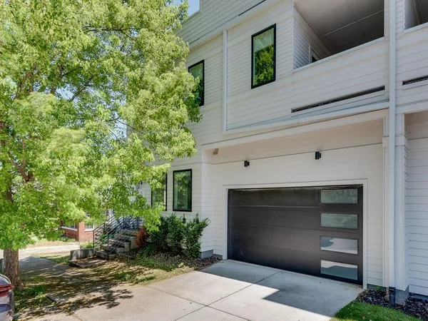 a front view of a house with yard
