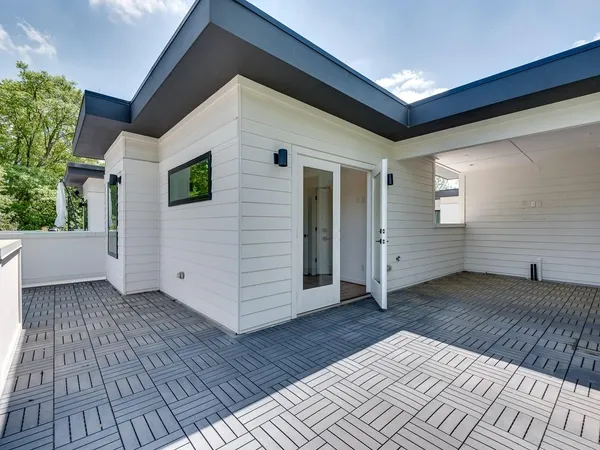 a view of a terrace with furniture