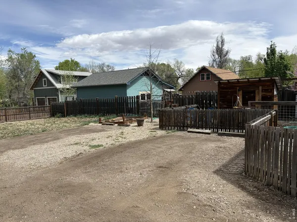 a view of a park with a tree