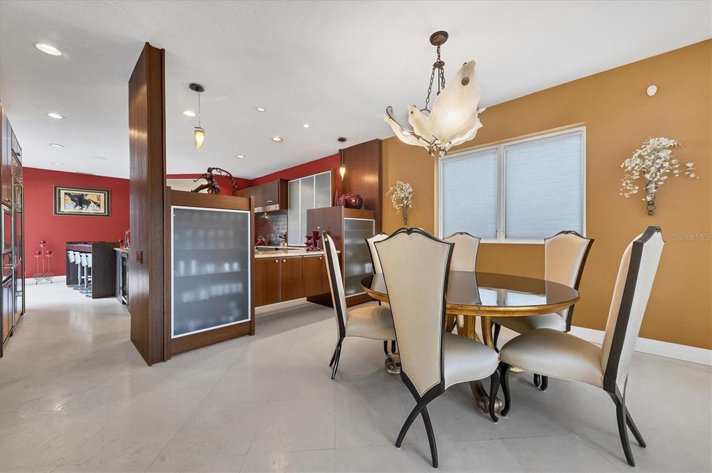 7716 Club Lane Sarasota, FL 34238 - Photo 19 of 68 a view of a dining room with furniture