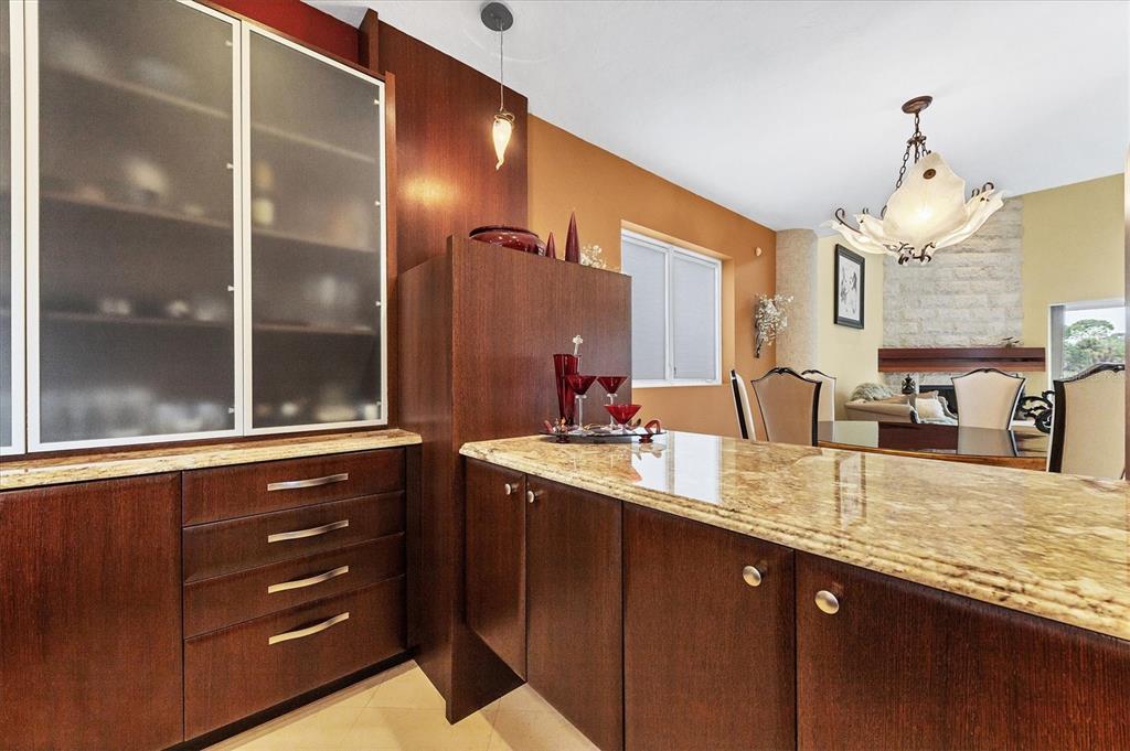 7716 Club Lane Sarasota, FL 34238 - Photo 26 of 68 a bathroom with a granite countertop sink and a mirror