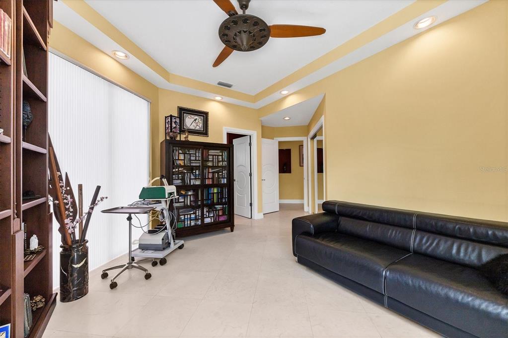 7716 Club Lane Sarasota, FL 34238 - Photo 40 of 68 a view of a livingroom with furniture and staircase